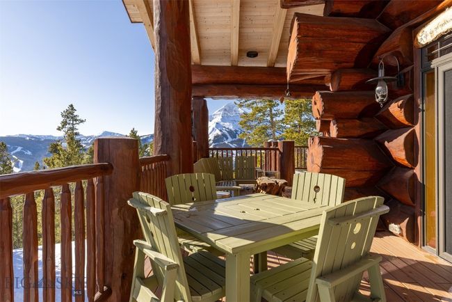 Covered deck area with Lone Mountain. | Image 63