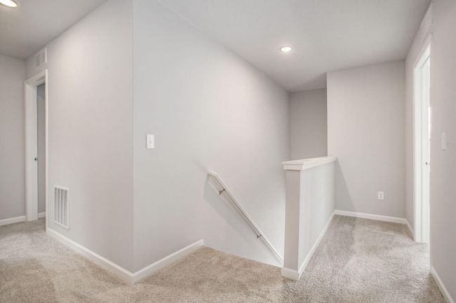 There are 4 bedrooms on the second floor, including the primary suite with private bath and WIC. The additional 3 bedrooms share a full bath. | Image 10