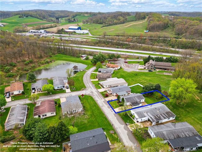 BLUE PROPERTY LINE DEPICTS THE APPROXIMATE PROPERTY LINES AND ARE FOR INFORMATIONAL PURPOSES NOT MEANT TO REPRESENT THE ACTUAL PROPERTY. | Image 25