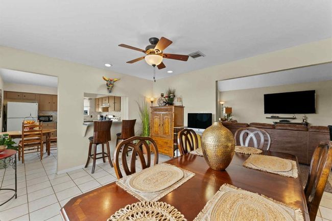 Open-concept dining area with a seamless flow into the kitchen—making mealtime, hosting, and everyday living easy and connected | Image 10