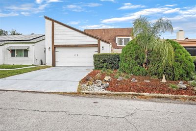 12824 Settlers Drive, House other with 3 bedrooms, 2 bathrooms and null parking in Hudson FL | Image 2