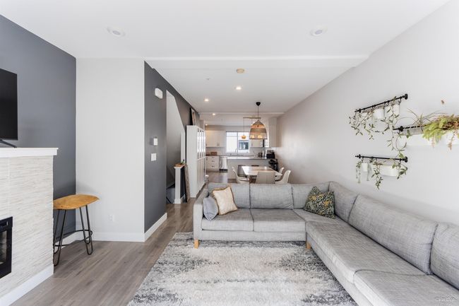 Living room featuring recessed lighting, wood finished floors, and baseboards | Image 4