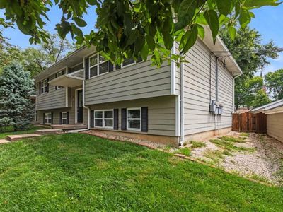 View of front facade with a front lawn | Image 3