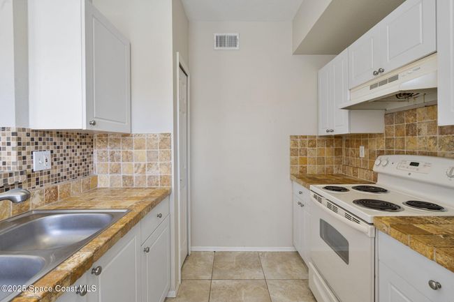 202 - 5693 Star Rush Dr, Condo with 2 bedrooms, 2 bathrooms and null parking in Melbourne FL | Image 16