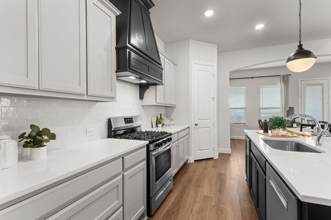 view from the mud room into the kitchen | Image 26