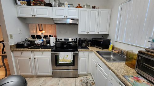 k14-601 Cypress Lake Blvd, Deerfield Beach, FL, 33064-5084 | Card Image