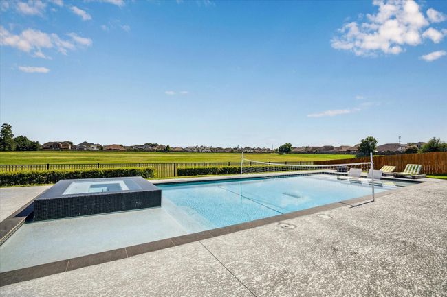Heated pool & spa over looking greenspace. | Image 25