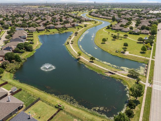 Aerial view of residential area with a nearby body of water | Image 33
