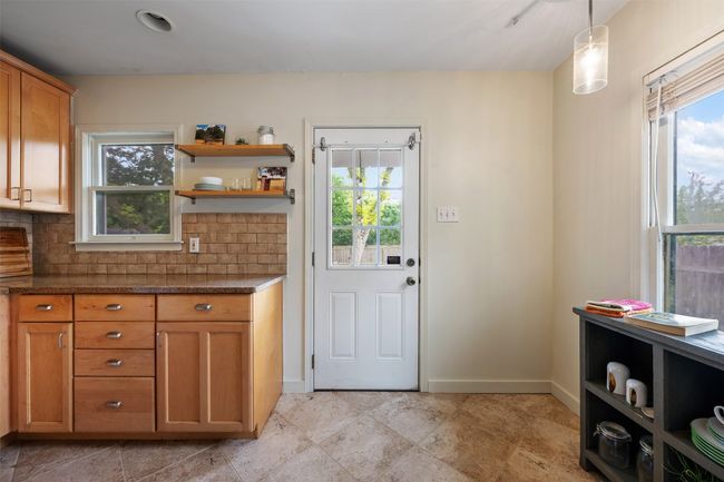 Kitchen with breakfast nook. | Image 11