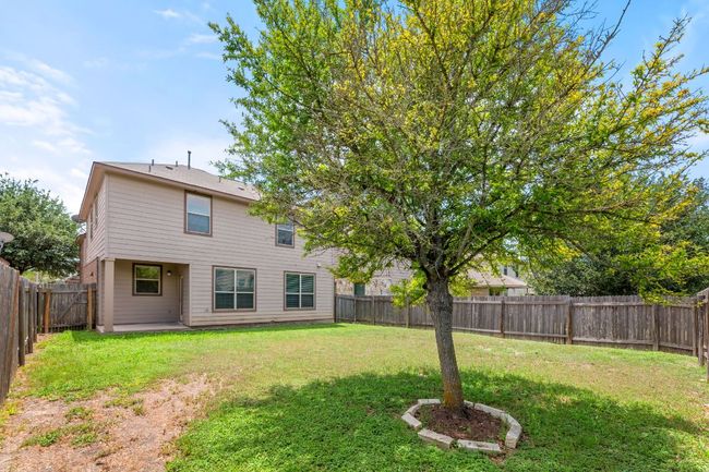 Rear view of property with a fenced backyard | Image 29