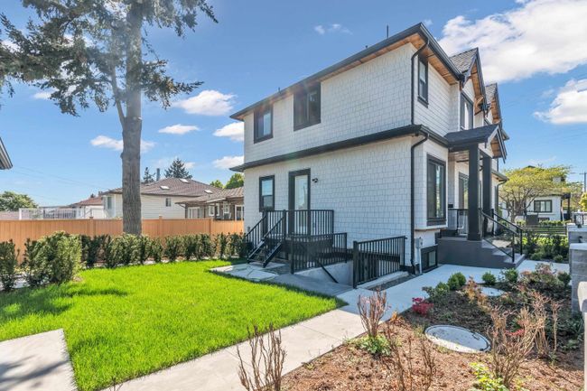 402 E 59 Th Avenue, Home with 6 bedrooms, 4 bathrooms and 2 parking in Vancouver BC | Image 1