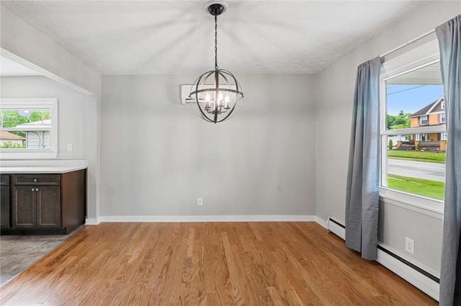 Formal dining room allowing for a place to enjoy family dinners | Image 6