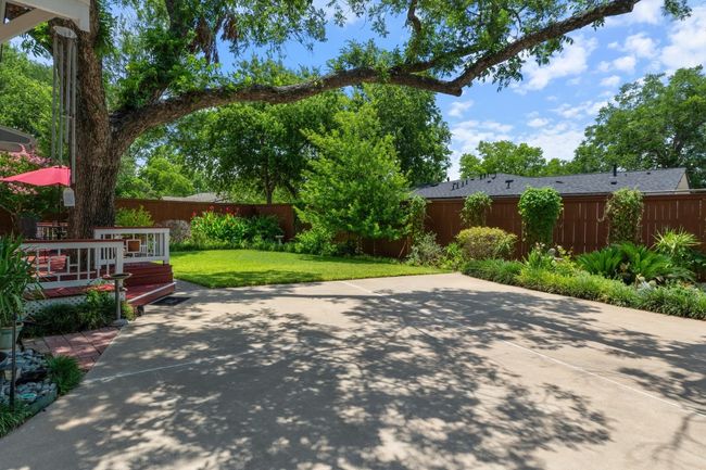 Fenced backyard featuring a patio | Image 25