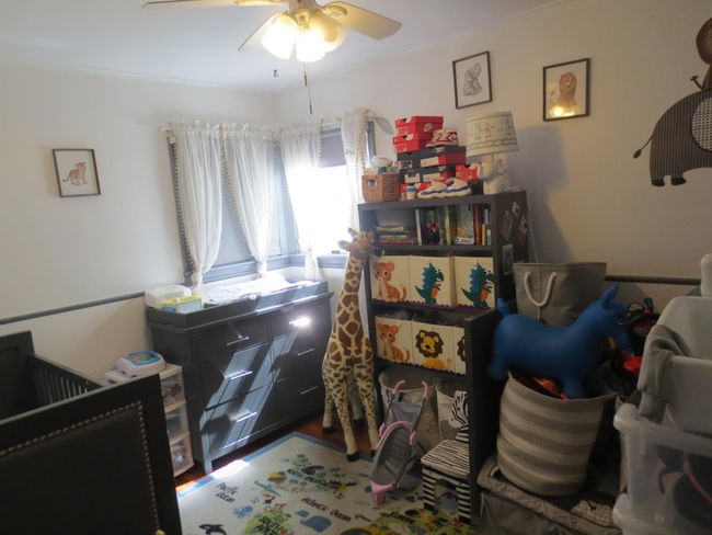 Bedroom with a ceiling fan | Image 4