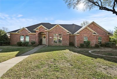 View of front of property with a front yard | Image 1