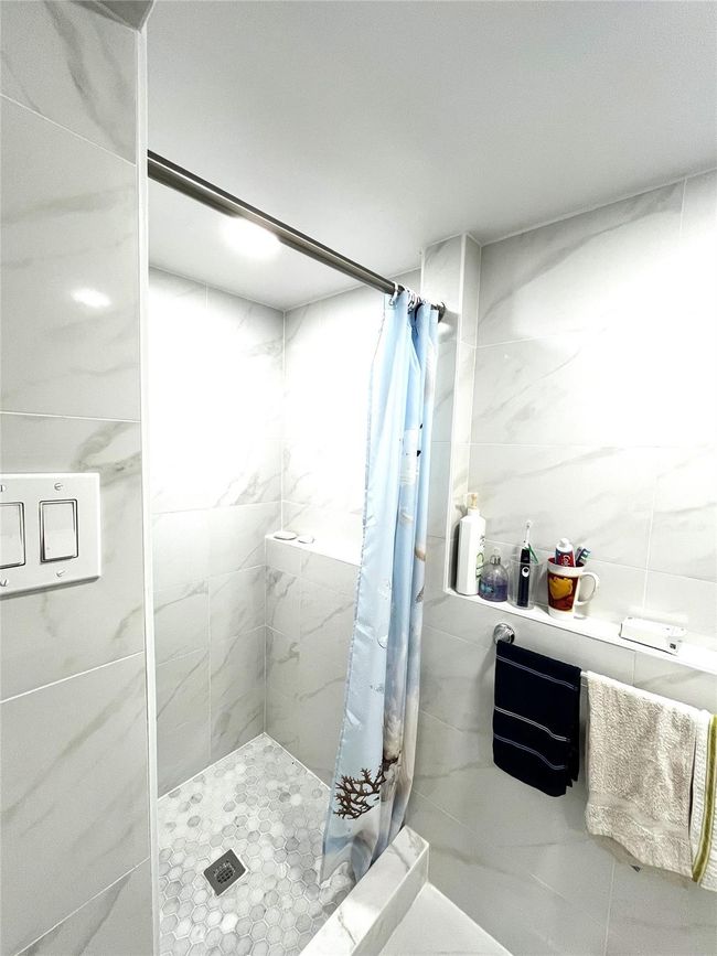 Full bath featuring a shower stall | Image 17
