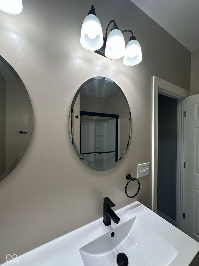 Unit 1 - Hall bathroom with double vanity | Image 14