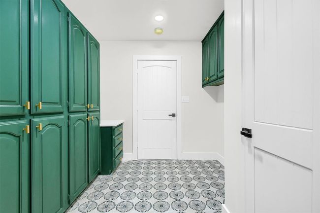 Laundry room with baseboards and recessed lighting | Image 19