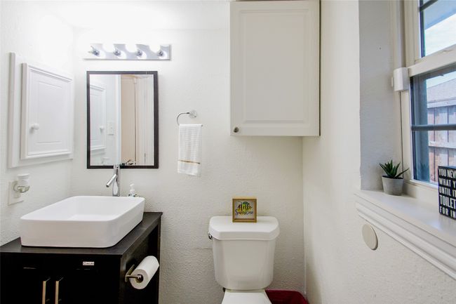 Bathroom with toilet and vanity | Image 28