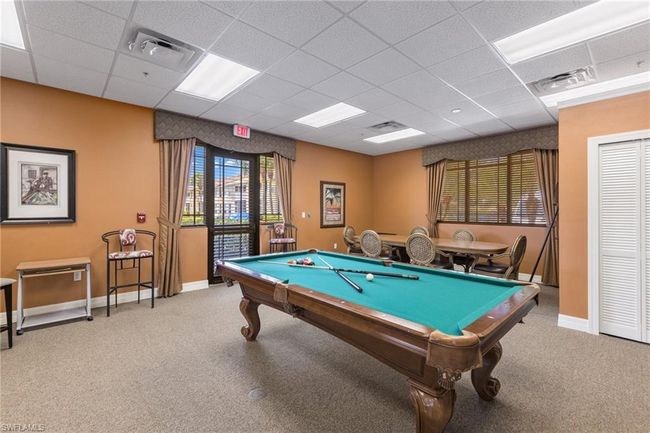 Playroom with carpet and a drop ceiling | Image 25