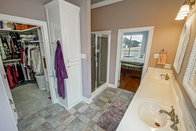 Separate shower. Lots of storage. Huge walk in closet | Image 22