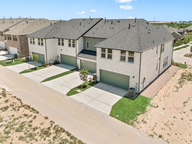 Featuring a spacious garage and drive, you'll find plenty of private off street parking in this dream home! | Image 18