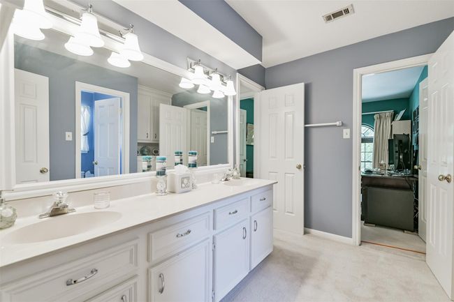 3rd Full Bath with extra cabinetry. This home has storage galore! | Image 37