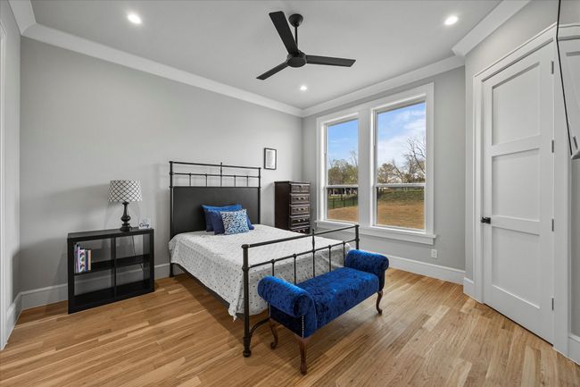 Guest bedroom includes walk in closet | Image 19