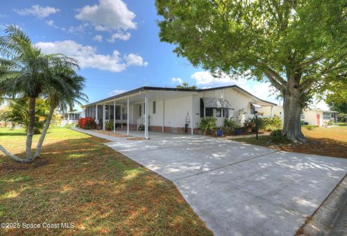 604 Amaryllis Dr, Barefoot Bay, FL, 32976-7117 | Card Image