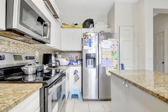 1910 Shoma Dr, Condo with 3 bedrooms, 4 bathrooms and null parking in Royal Palm Beach FL | Image 22