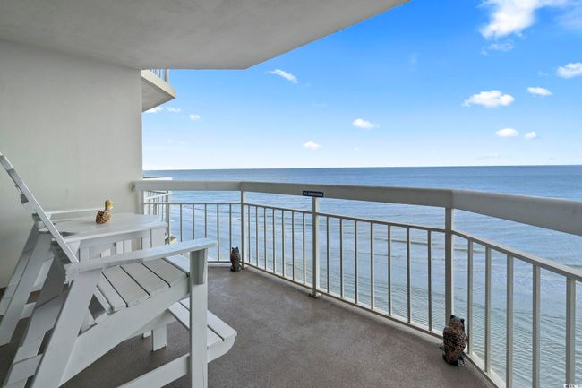 Balcony featuring a water view | Image 31
