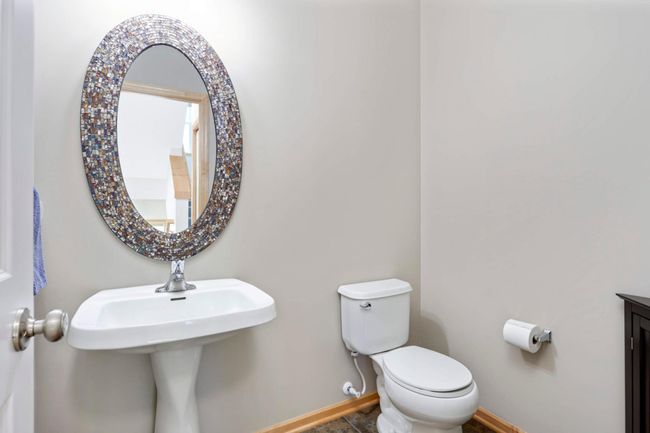 Main level 1/2 bath with ceramic flooring | Image 13