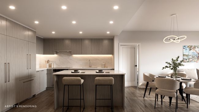 Kitchen featuring a center island, light countertops, and modern cabinets | Image 5