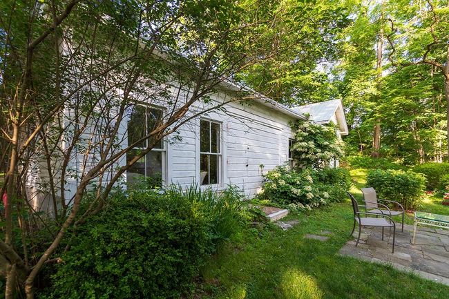 Exterior of apartment with patio | Image 23