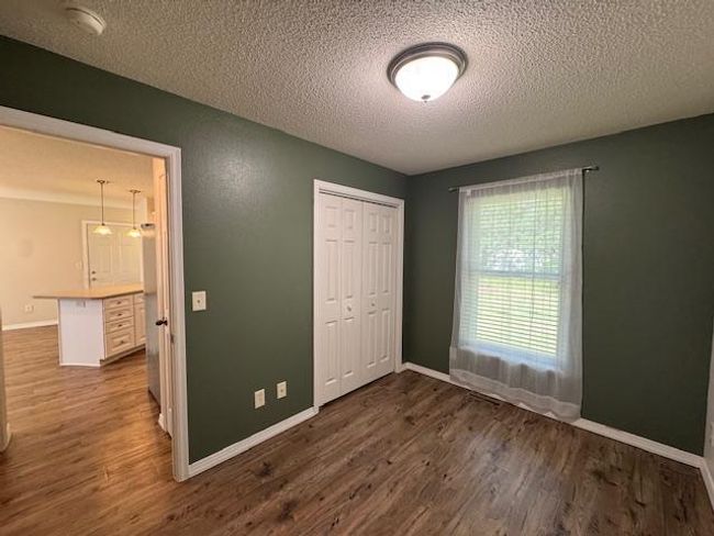 Second main floor bedroom off kitchen | Image 34