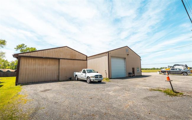 View of outbuilding featuring an outbuilding and fence | Image 28