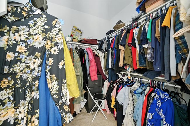 Spacious closet featuring carpet flooring | Image 23
