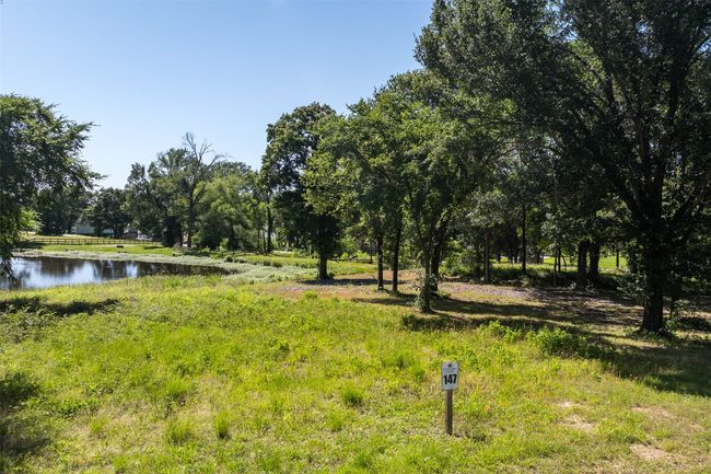 View of yard featuring a water view | Image 11