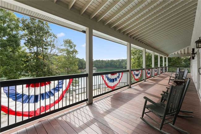 Lodge Covered Porch - Agent Owned Photo | Image 37
