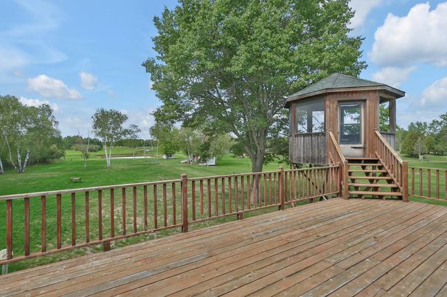 View of the deck and gazebo facing west to rear of the property. Nothing says private like a 50 acre back yard. Maybe a private par 3 golf course? Endless possibilities. | Image 29
