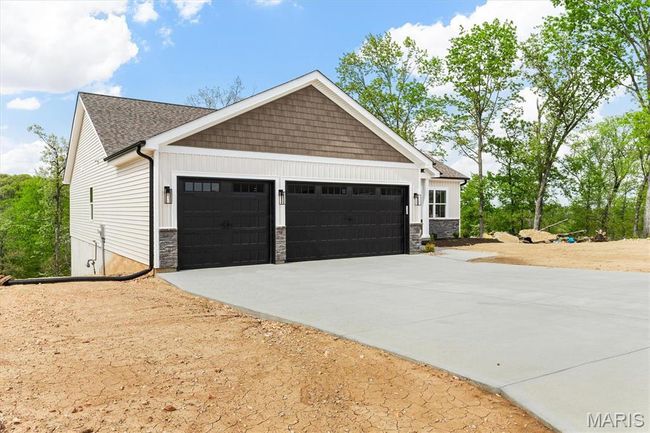 Downspouts will be buried and sod laid prior to closing. | Image 5