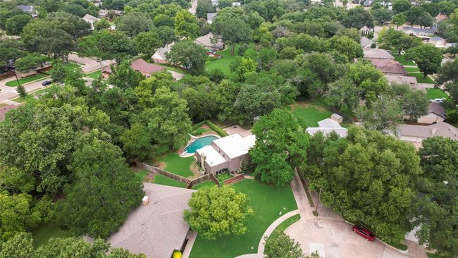 Aerial perspective of suburban area with a pool area | Image 37