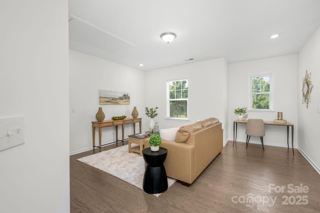 Upstairs flex space is about the size of a two car garage so it can easily be a single or multi-purpose space | Image 16