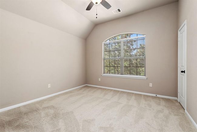 Bedroom #2 up with tall ceiling and walk in closet. | Image 30