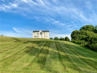 View of the beautiful front yard. | Image 1