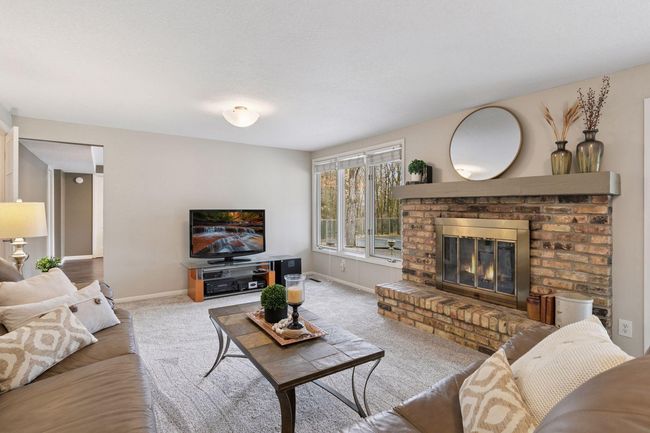 Lower level family room with updated carpet (2022) | Image 29