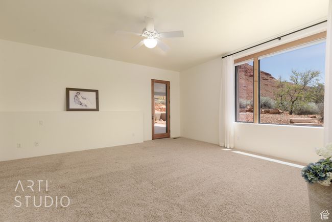 Unfurnished room featuring carpet floors and ceiling fan | Image 26