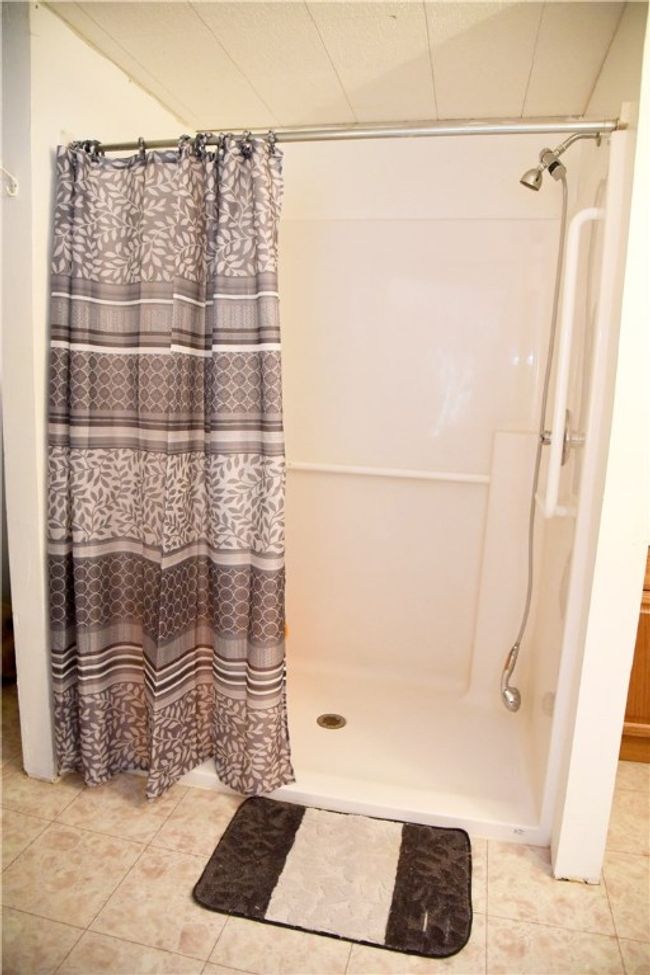 main floor bath has walk in shower and handicap accesible | Image 12
