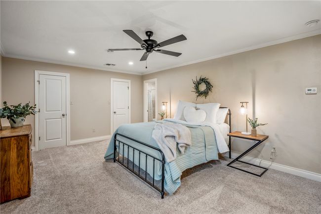 Carpeted bedroom with recessed lighting, visible vents, baseboards, and ornamental molding | Image 23