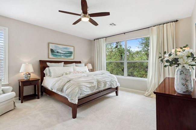 This extra large primary suite is situated upstairs, well separated from the secondary bedrooms for privacy. | Image 21